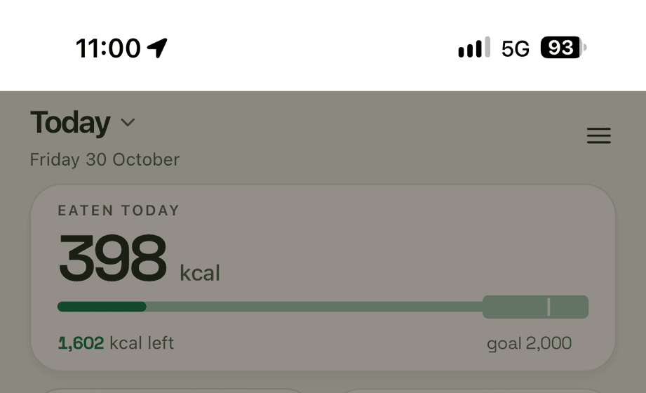 The meal sheet opened on top of the Today screen. Everything behind it is dimmed, but the white strip behind the clock stays bright white.